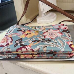 Lauren Ralph Lauren beautiful floral crossbody. Never worn blue. Two zip sides